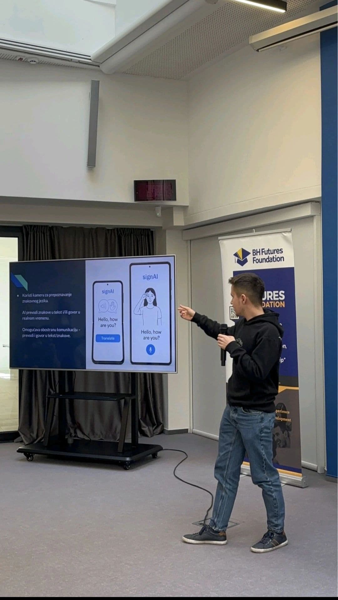 Pitching signAI — an AI sign-language translator — at a BH Futures Foundation hackathon